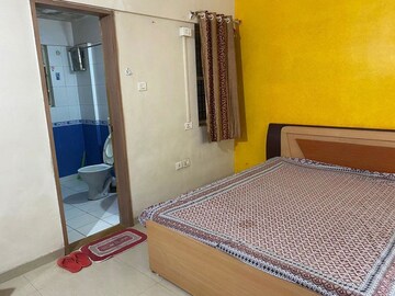 Bedroom in 2 BHK Apartment at Devi Lotus, Bopodi – for Rent