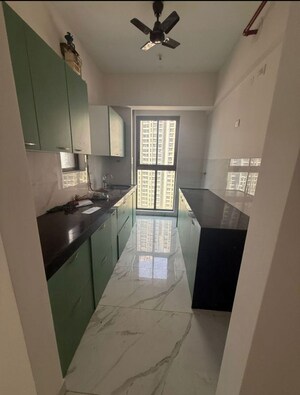 Kitchen in 2 BHK Apartment at Raymond Ten X Habitat, Pokhran Road No Two – for Rent