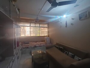 Living Room in 1 BHK Apartment at Marzban CHS, Vile Parle East – for Rent