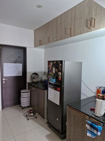 Kitchen in 2 BHK Apartment at Shah Gagan Garima, Aundh Road – for Rent