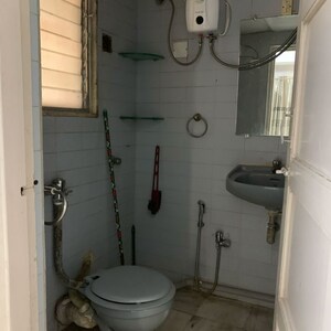 Bathroom in 2 BHK Apartment at Shree Rameshwar Tower, Sri Krishna Nagar – for Sale