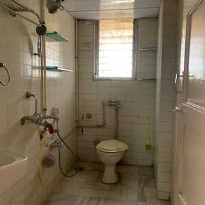 Bathroom in 2 BHK Apartment at Shree Rameshwar Tower, Sri Krishna Nagar – for Sale