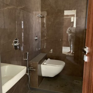 Bathroom in 2 BHK Apartment at Goyal Abhiram, Kastur Park – for Sale