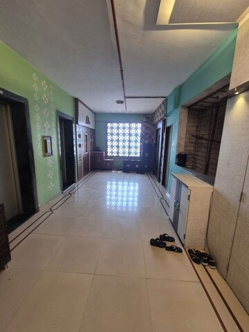 Living Room in 1 BHK Apartment at Yasho Deep Heights, Gothivali Village – for Sale