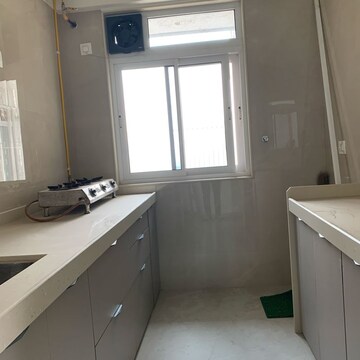 Kitchen in 3 BHK Apartment at Shraddha Elite, Poisar – for Rent