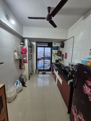 Kitchen in 2 BHK Apartment at Yasho Deep Heights, Gothivali Village – for Sale
