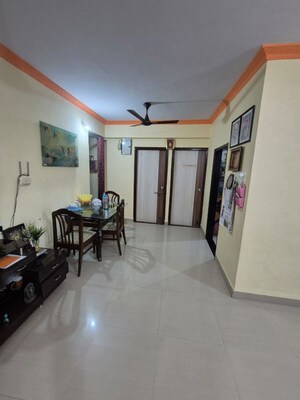 Living Room in 2 BHK Apartment at Yasho Deep Heights, Gothivali Village – for Sale