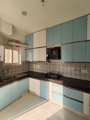 Kitchen in 2 BHK Apartment at Urban Axis Urban Woods, Sushant Golf City – for Rent