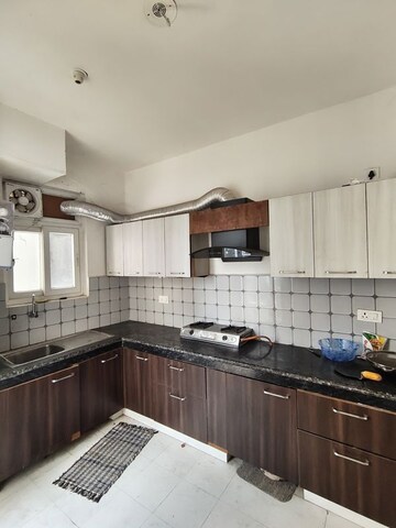 Kitchen in 2 BHK Apartment at Urban Axis Urban Woods, Sushant Golf City – for Rent