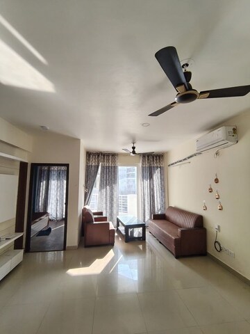 Living Room in 2 BHK Apartment at Urban Axis Urban Woods, Sushant Golf City – for Rent