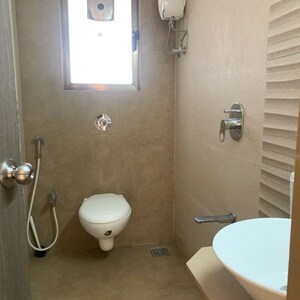 Bathroom in 2 BHK Apartment at Axiom Girdhar Apartment, Kastur Park – for Rent
