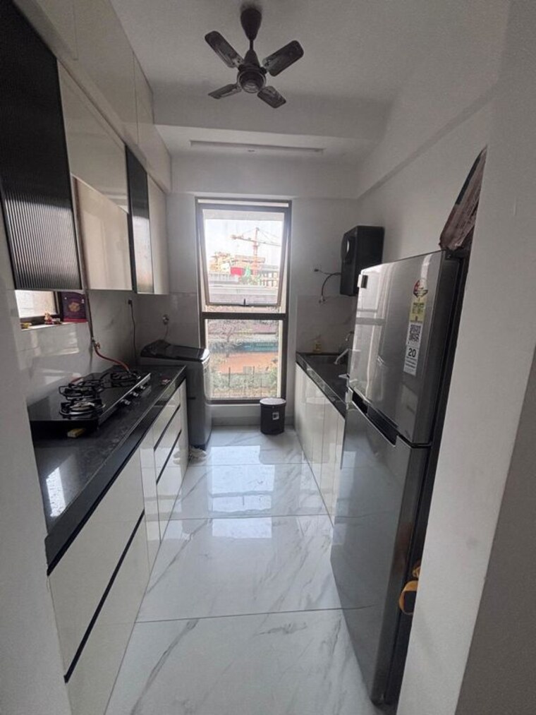 Kitchen, raymond-ten-x-vibes 1 Bedroom 470 Sq.Ft. Apartment In J K Gram Thane 10027345