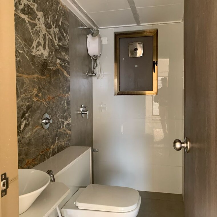 Bathroom, aadhunik-bansi-terrace-chs 3 Bedroom 1084 Sq.Ft. Apartment In Dalvi Nagar Mumbai 10027348