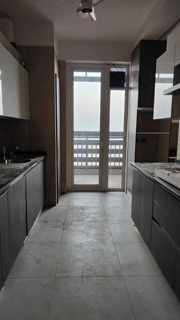 Kitchen in 5 BHK Apartment at Mahindra Luminare, Sector 59 – for Rent