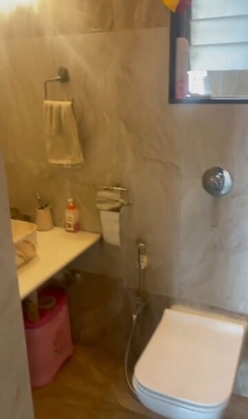 Bathroom in 2 BHK Apartment at Jasmine Tower, Vasant Vihar – for Rent