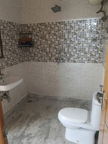 Bathroom in 3 BHK Builder Floor at Ansal Plaza Sector-23, Sector 23 – for Rent