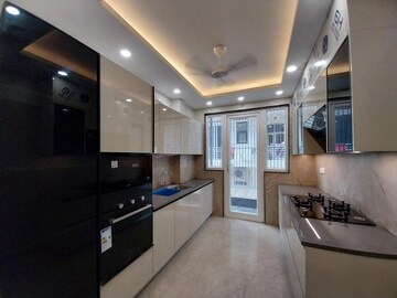 Kitchen in 4 BHK Builder Floor at Sushant Lok I – for Sale