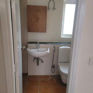 Bathroom in 2 BHK Apartment at Kosmos Heights, Sector 134 – for Rent