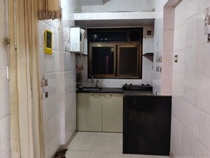 Kitchen in 1 BHK Apartment at Fatima Arch CHS, Santacruz East – for Rent