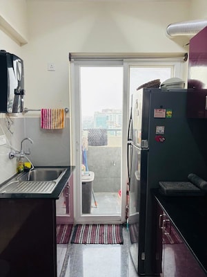 Kitchen in 2 BHK Apartment at Ahad Opus, Sarjapur – for Rent