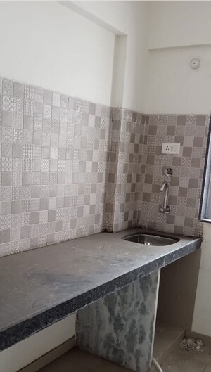 Kitchen in 1.5 BHK Apartment at Kohinoor CHS, Sector 8 Sanpada – for Rent