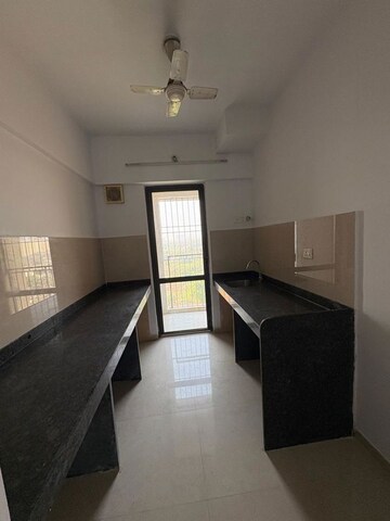 Kitchen in 1 BHK Apartment at Lodha Lakeshore Greens, Dombivli East – for Rent