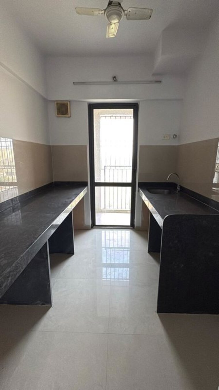 Kitchen, lodha-palava-city-lakeshore-greens 1 Bedroom 504 Sq.Ft. Apartment In Dombivli East Thane 10027554