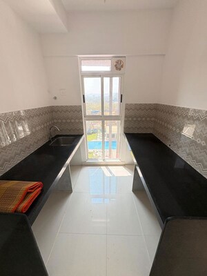 Kitchen in 2 BHK Apartment at Lodha Codename Premier, Dombivli East – for Rent