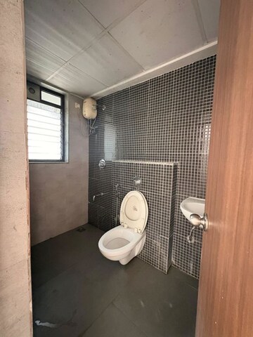 Bathroom in 2 BHK Apartment at Lodha Palava City Lakeshore Greens, Dombivli East – for Rent