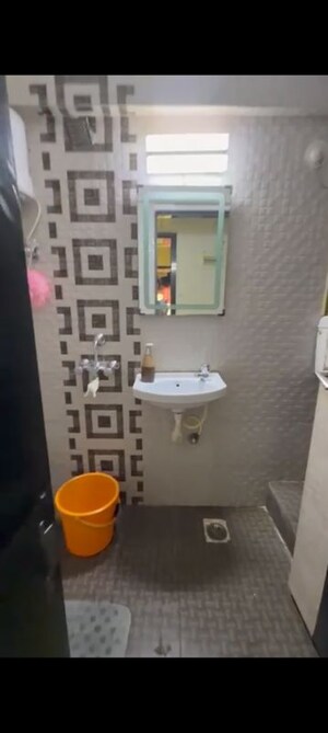 Bathroom in 2 BHK Apartment at Tilak Nagar – for Rent