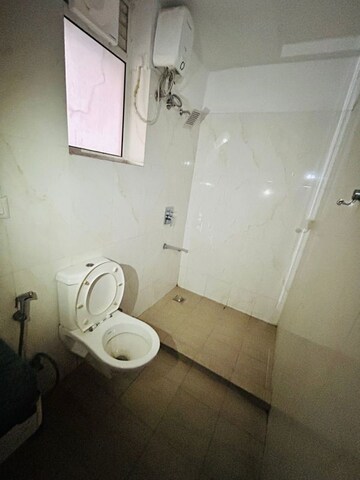 Bathroom in 1 RK Apartment at DLF My Pad, Gomti Nagar – for Rent