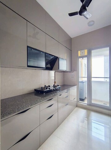 Kitchen in 2 BHK Apartment at Piramal Vaikunth, Balkum Pada – for Rent