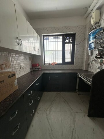 Kitchen in 2 BHK Builder Floor at Patel Nagar Society, Sector 15 – for Rent