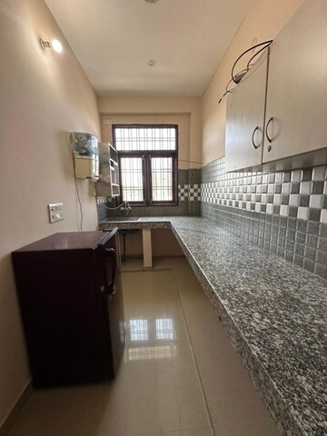 Kitchen in 2 BHK Builder Floor at Vijay Ratan Vihar, Sector 15 – for Rent