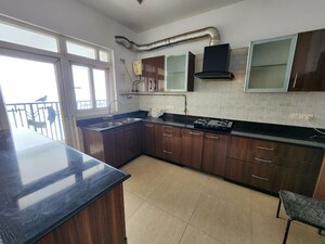 Kitchen in 2.5 BHK Apartment at Great Value Sharanam, Sector 107 – for Rent