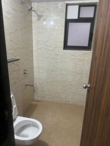 Bathroom in 3 BHK Apartment at Shapoorji Pallonji Sensorium, Hinjewadi – for Rent