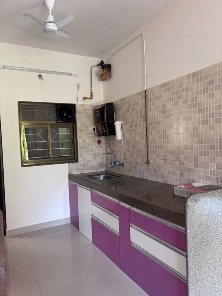 Kitchen, siddhivinayak-echoing-greens 2 Bedroom 1050 Sq.Ft. Apartment In Wakad Pune 10028043