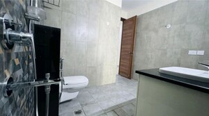 Bathroom in 4 BHK Apartment at Uchdpl Veridia Oakwood Enclave, Wave City – for Rent