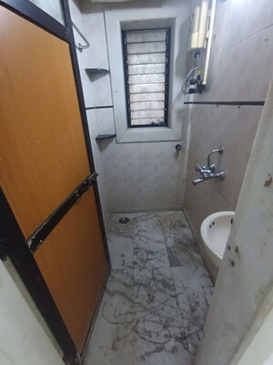 Bathroom in 1 BHK Apartment at Manali Building, Malad West – for Rent