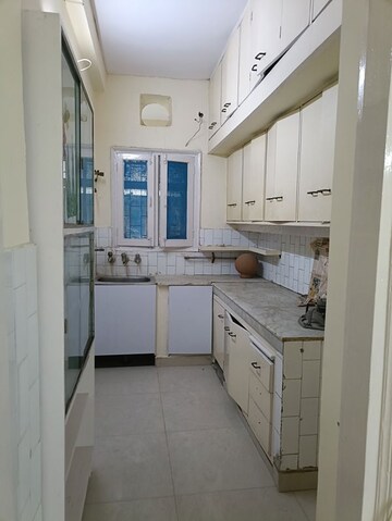 Kitchen in 3 BHK Apartment at Vasundhara Enclave – for Sale