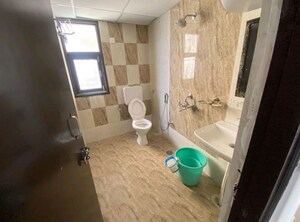 Bathroom in 3 BHK Apartment at Sanchar Nest Palm Valley, Wave City – for Rent