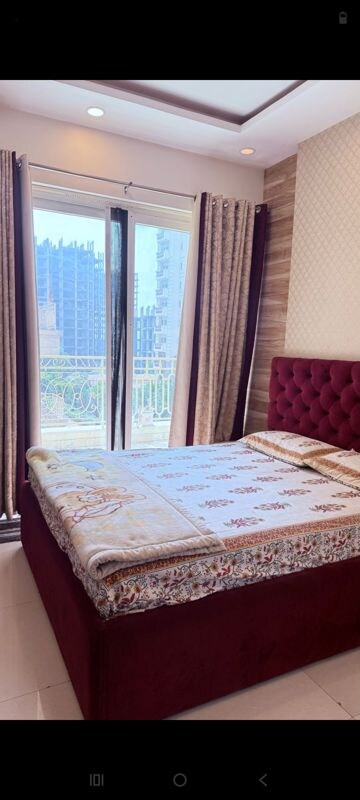 Bedroom in 4 BHK Apartment at Mahagun Mirabella, Sector 79 – for Rent