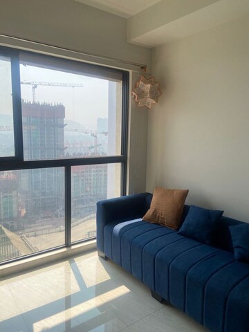 Living Room in 1 BHK Apartment at Lodha Crown Quality Homes, Majiwada – for Rent