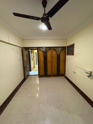 Room in 2 BHK Apartment at Devansh Villa, Bandra West – for Rent