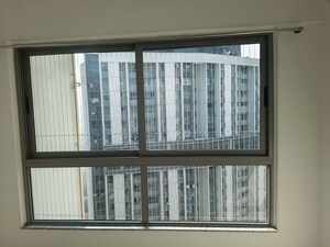 Room in 2 BHK Apartment at Kalpataru Immensa F, Kolshet Road – for Rent