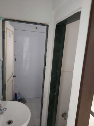 Bathroom in 1 BHK Apartment at Sudhir Anandi, Prabhat Road – for Rent