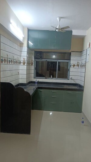 Kitchen in 2 BHK Apartment at Lourdes Heritage Apartment, Malad West – for Rent