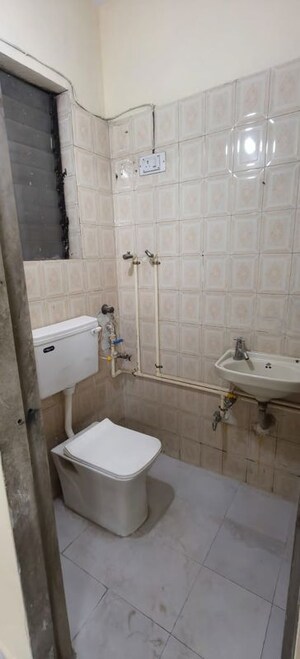 Bathroom in 2 BHK Apartment at VR Swarg, Nerul Sector 21 – for Rent