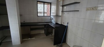 Kitchen in 2 BHK Apartment at VR Swarg, Nerul Sector 21 – for Rent