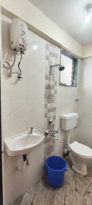 Bathroom in 1 BHK Apartment at Conwood Astoria, Goregaon East – for Rent